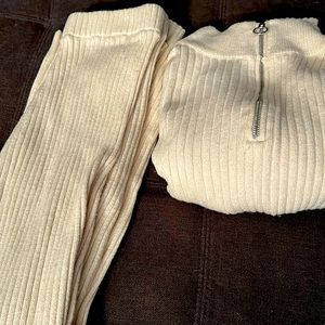 Two piece outfit, very comfy, warm, and stretchy. Pants have slight flare.